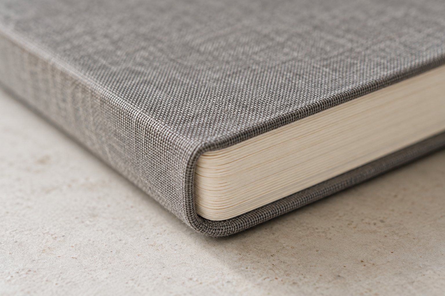 Rounded notebook cover and neatly cut cream page corners