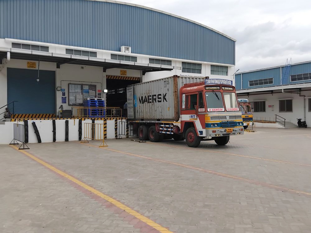 Container truck loading at the export dock