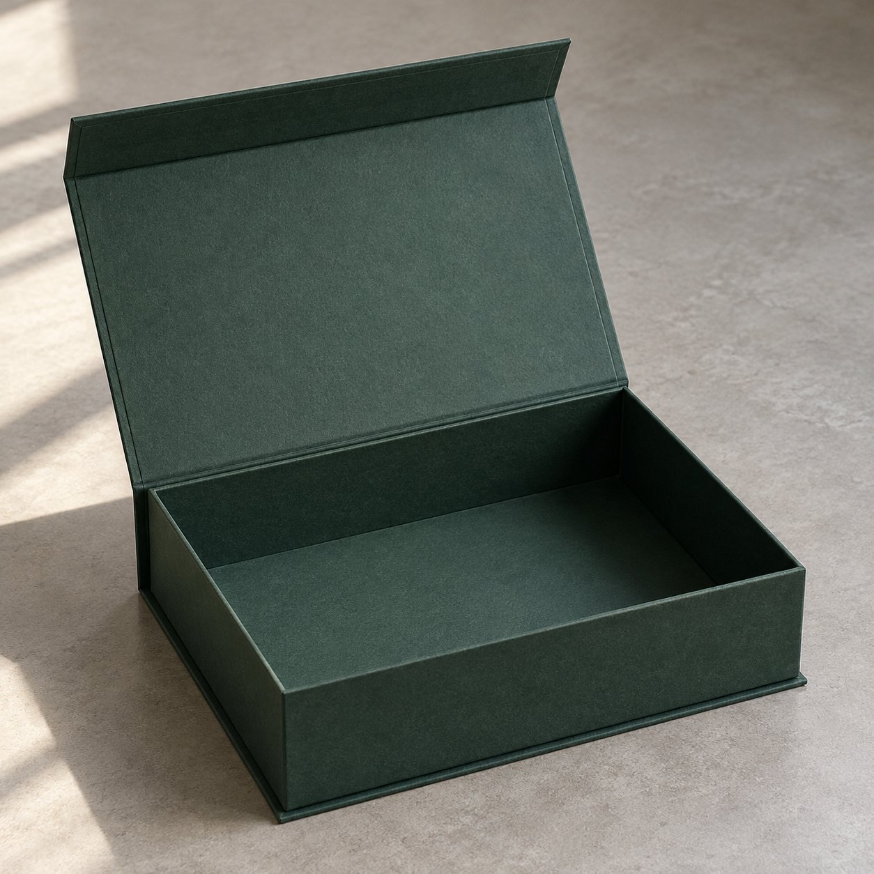 Open paper-wrapped rigid presentation box with a hinged magnetic lid
